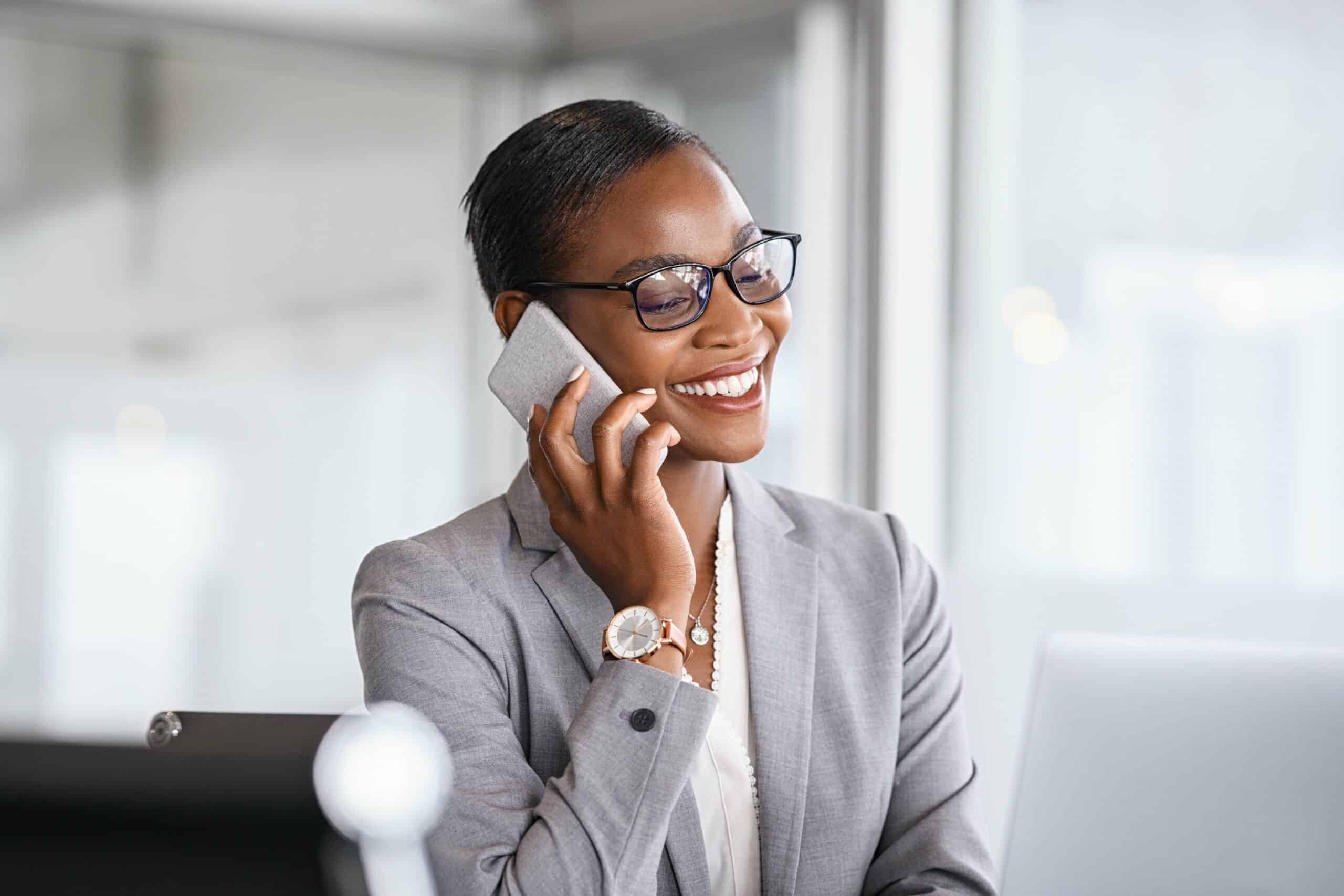 successful-african-business-woman-talking-on-phone-2022-09-08-19-20-13-utc-min